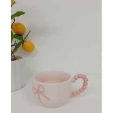TAZA DE CERAMICA ROSA CON MOÑO
